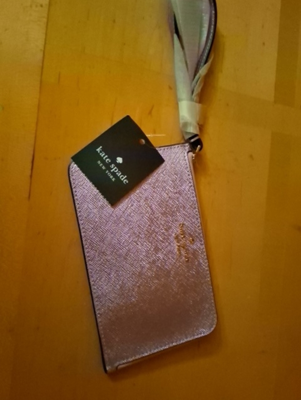 kate spade Metallic Pink Wristlet Phone Case with Strap